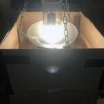 a light bulb inside carton boxes